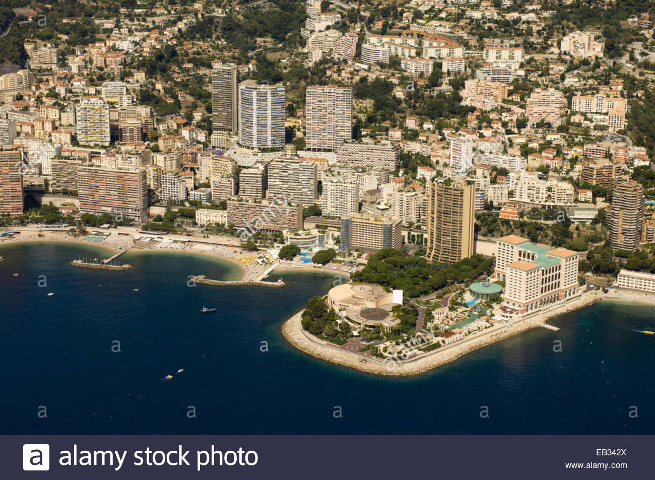 an aerial view of the monte carlo bay hotel resort and casino, and an aerial view of the monte carlo bay hotel resort and casino, and
