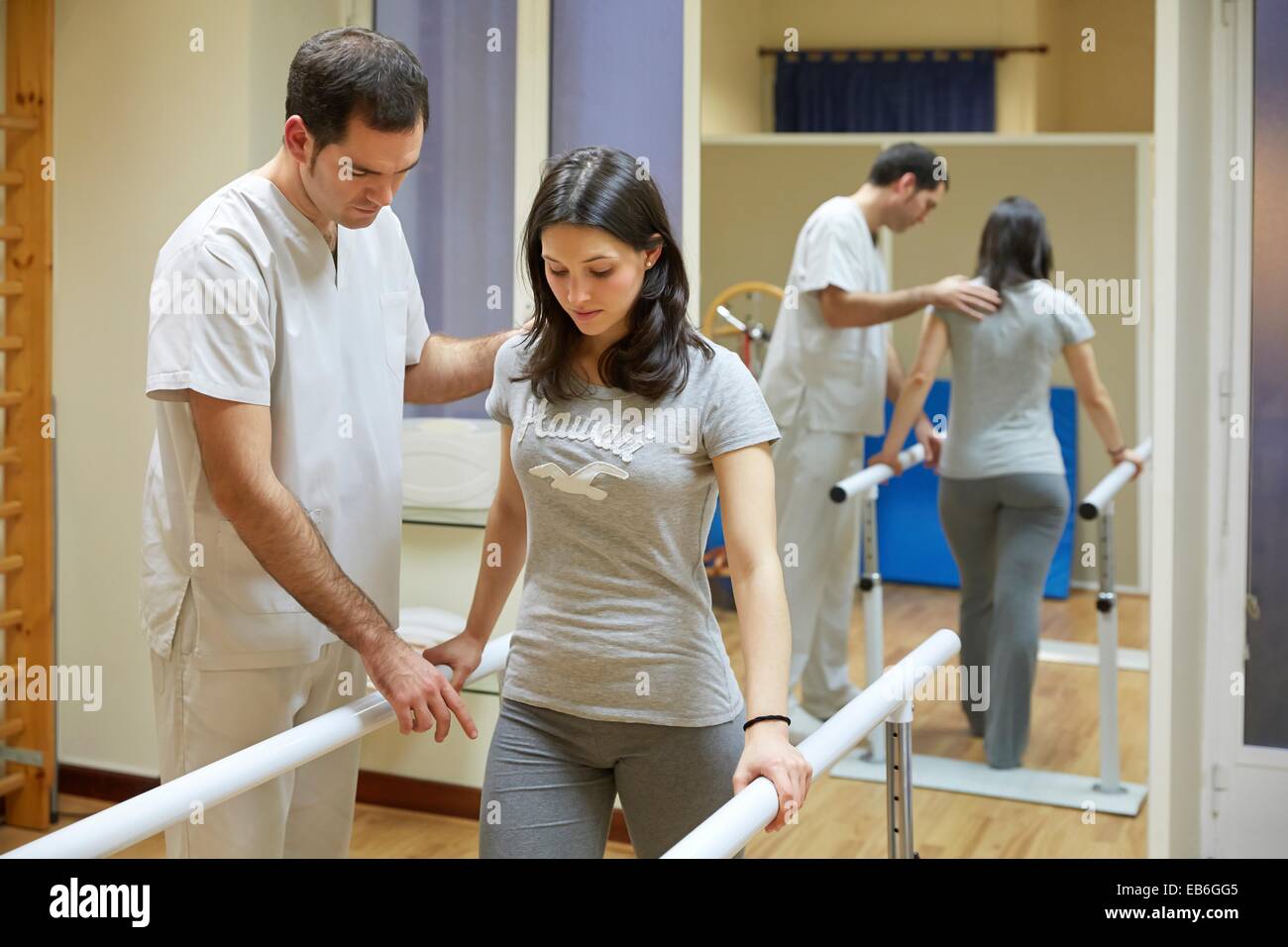 Gait training in parallel Gym Physiotherapy medical center Stock Photo, Royalty Free Image