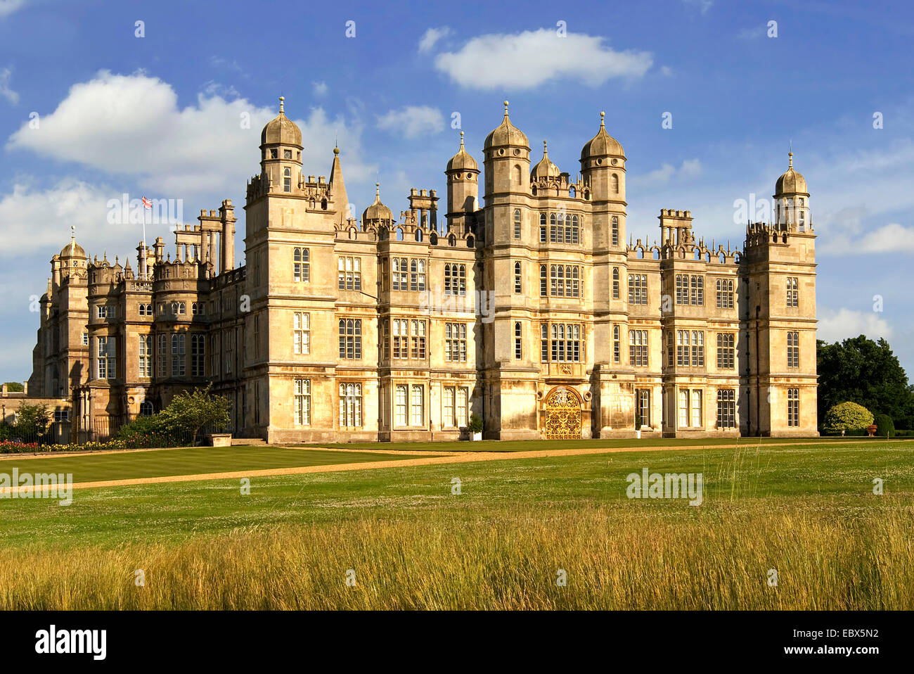 country castle Burghley House near Stamford, United Kingdom, England Stock Photo, Royalty Free