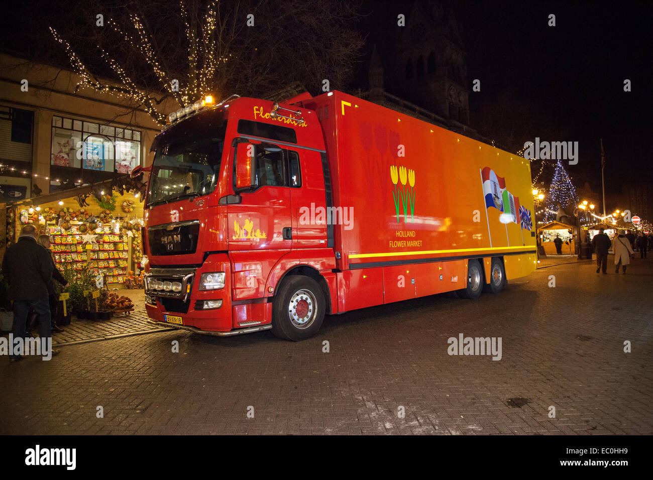 MAN Red Delivery Vehicles Holland Flower Market Delivering Goods To Chester Christmas Cheshire UK MAN Red Delivery Vehicles Holland Flower Market Delivering Goods To Chester Christmas Cheshire UK