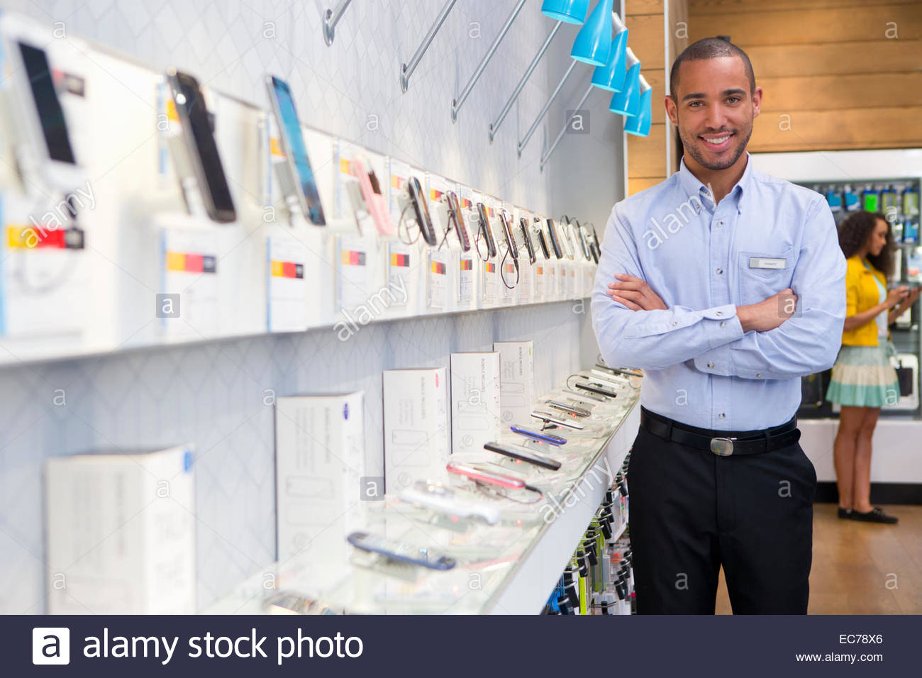 Store manager in phone shop Stock Photo, Royalty Free Image 76378014