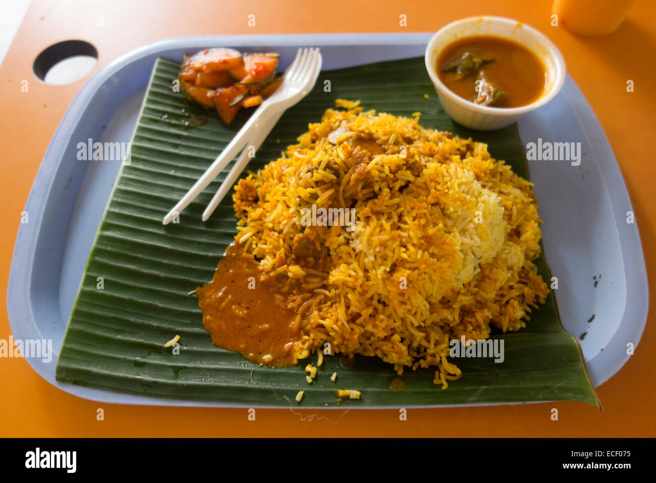 Indian Spicy Lamb Biryani Curry And Rice Meal On A Banana Leaf Stock