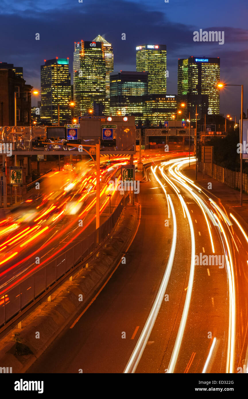 Traffic on A102 Blackwall Tunnel Approach with Canary Wharf Stock Photo