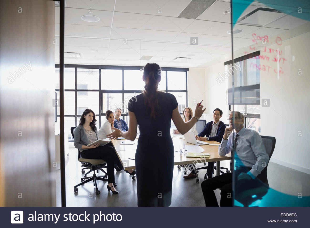 Businesswoman leading meeting in conference room Stock Photo, Royalty