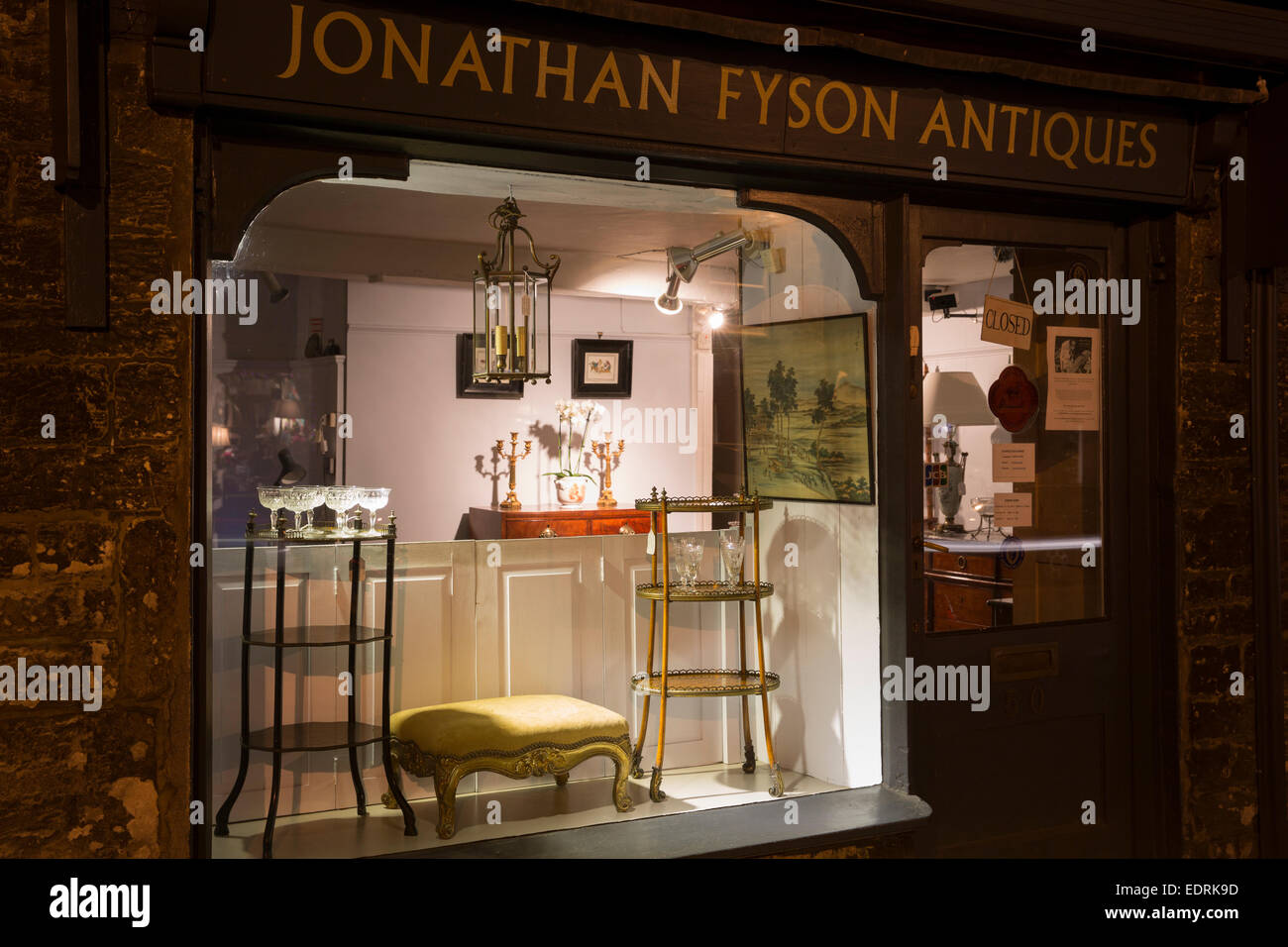 Antiques in window display at antique shop along Burford High Street