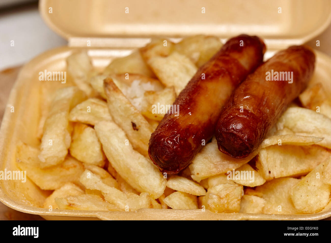 two sausages and chips a sausage supper from a british takeaway Stock ...