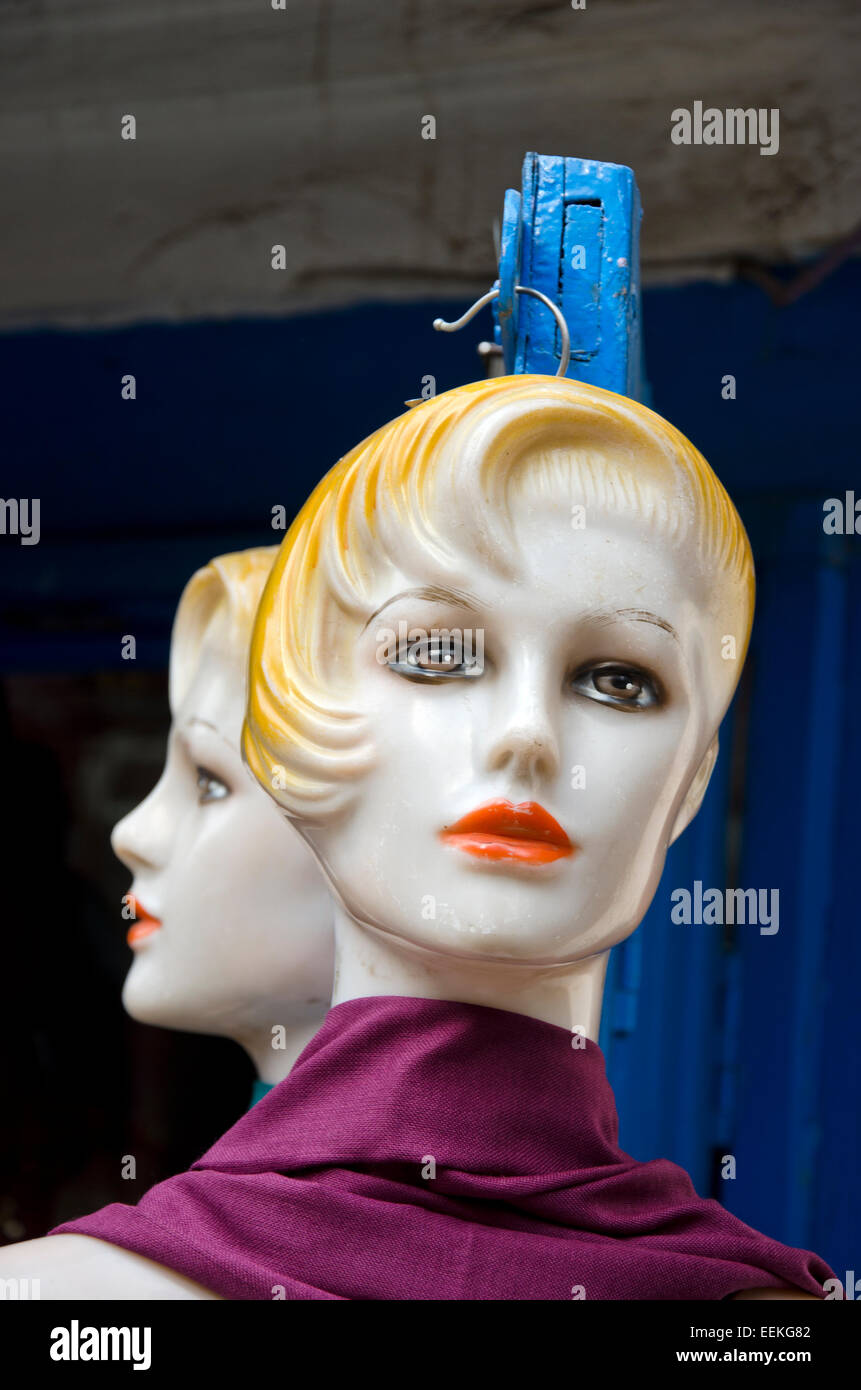 Stock Photo - two plastic mannequin head in asia street, Kathmandu, Nepal - two-plastic-mannequin-head-in-asia-street-kathmandu-nepal-EEKG82