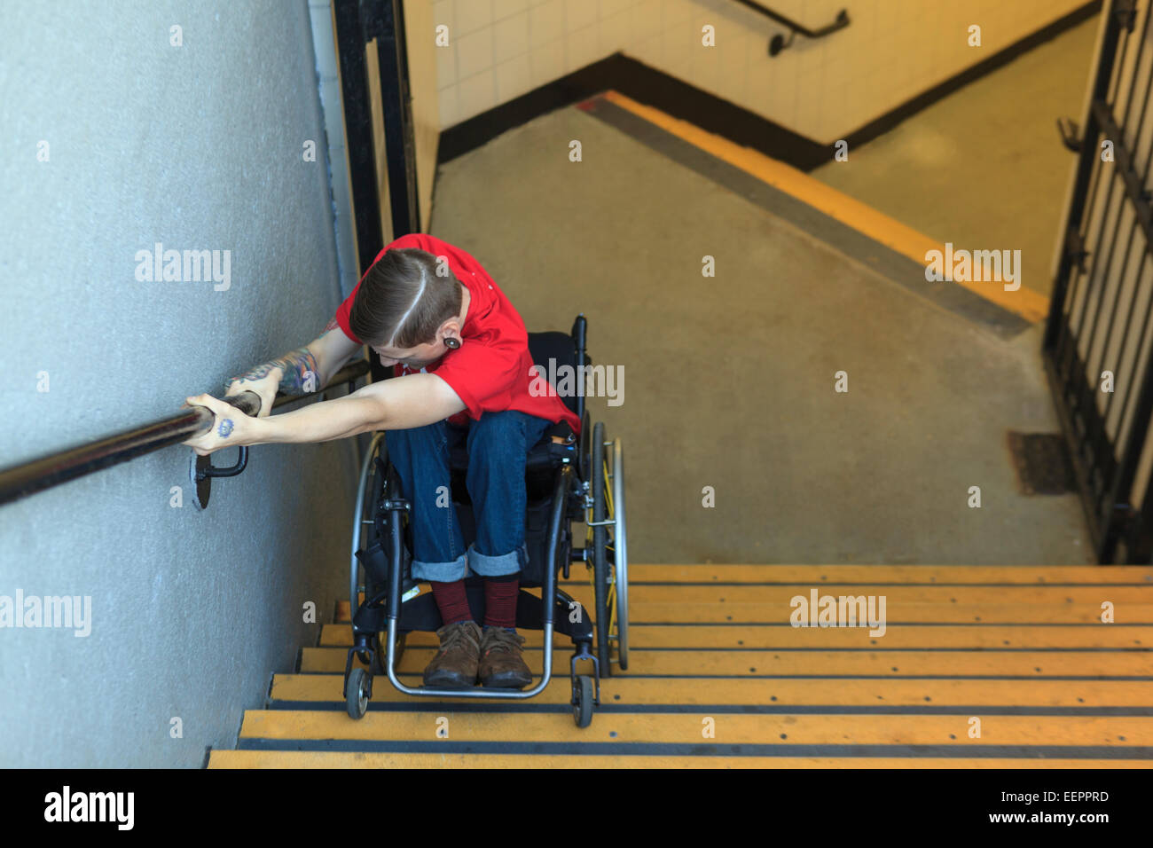 Trendy man with a spinal cord injury in wheelchair going down subway Stock Photo 77947505 Alamy