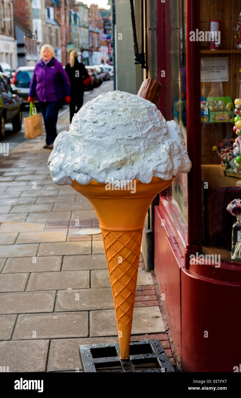 Giant promotional model of an ice cream cone / outside a sweet