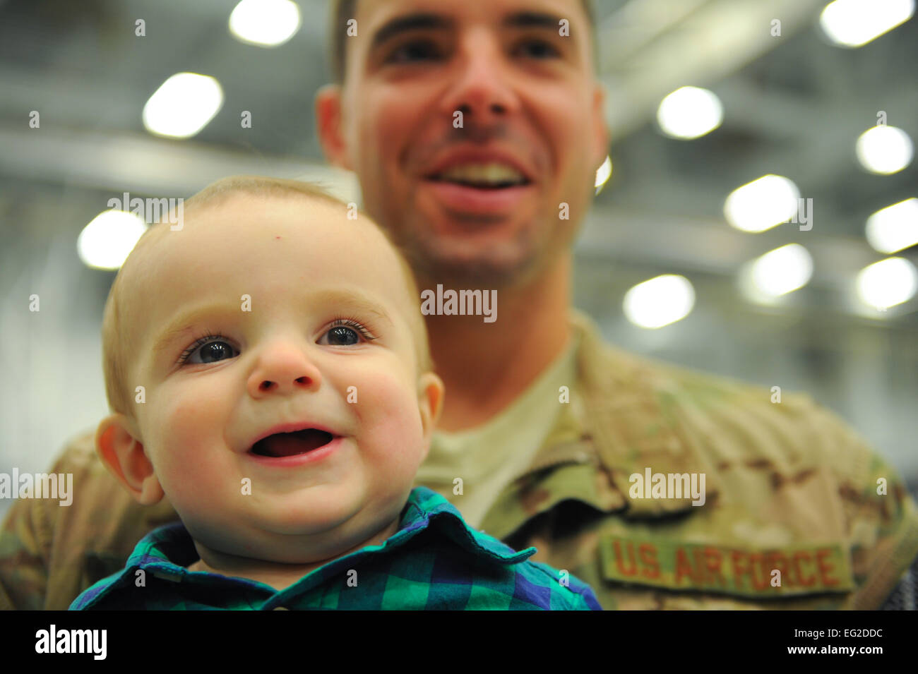 Aiden Robillard smiles in the arms of his father, Staff Sgt. <b>Tim Robillard</b>, ... - aiden-robillard-smiles-in-the-arms-of-his-father-staff-sgt-tim-robillard-EG2DDC