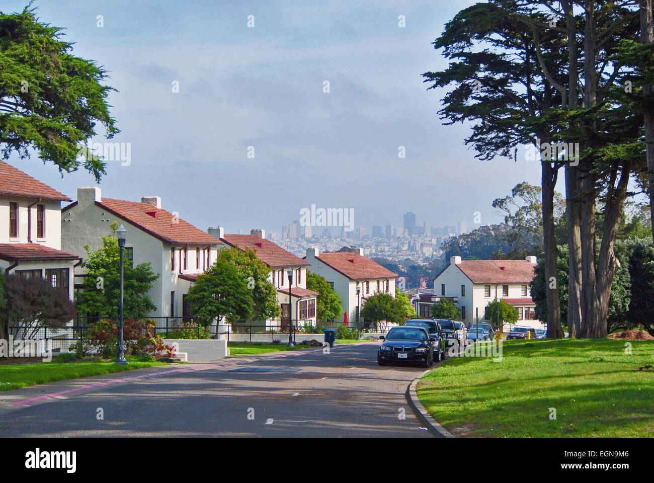 historic homes on wide street in the Presidio of San Francisco Stock