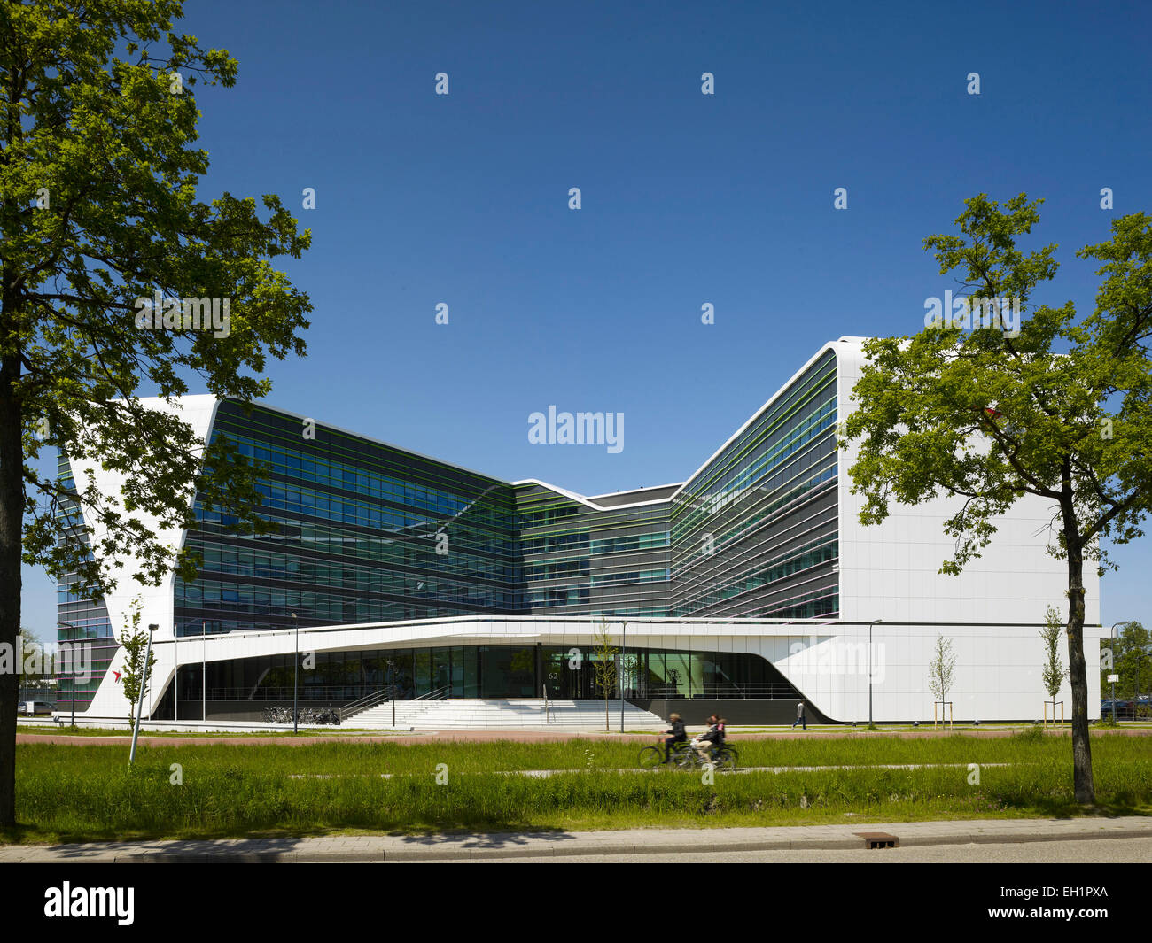 Front Elevation Of Building Part - 45: Overall Front Elevation Of Building Facade With Landscaped Cycle Path. Astellas Offices - Mirai House, Leiden, Netherlands. Arch