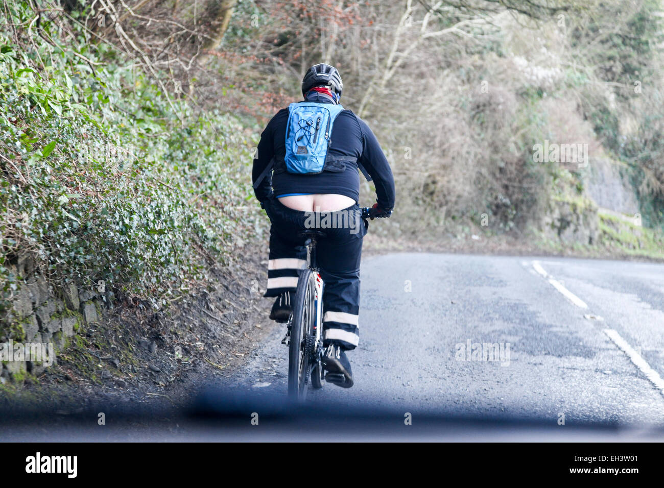 an-overweight-cyclist-showing-his-bum-or