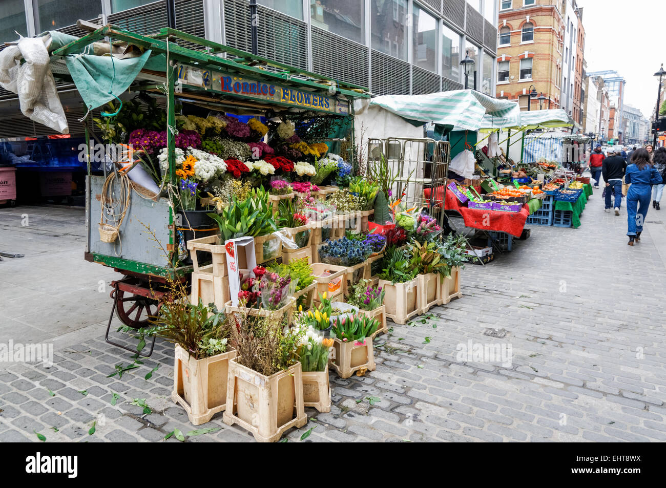 Florist's stall at Berwick Street Market, London England United Stock