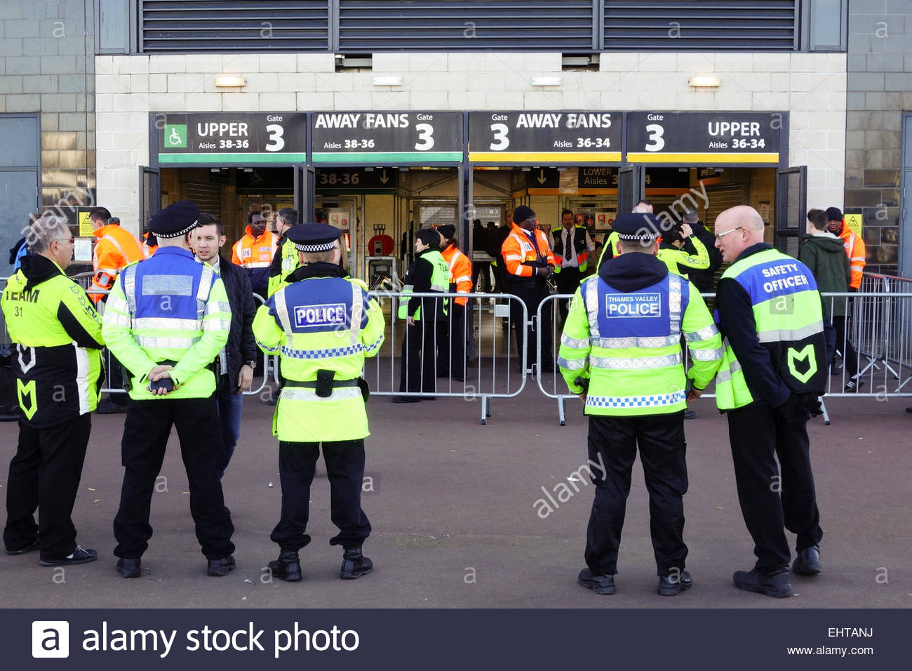 Police and Security staff outside the Away Fans entrance to MK Dons