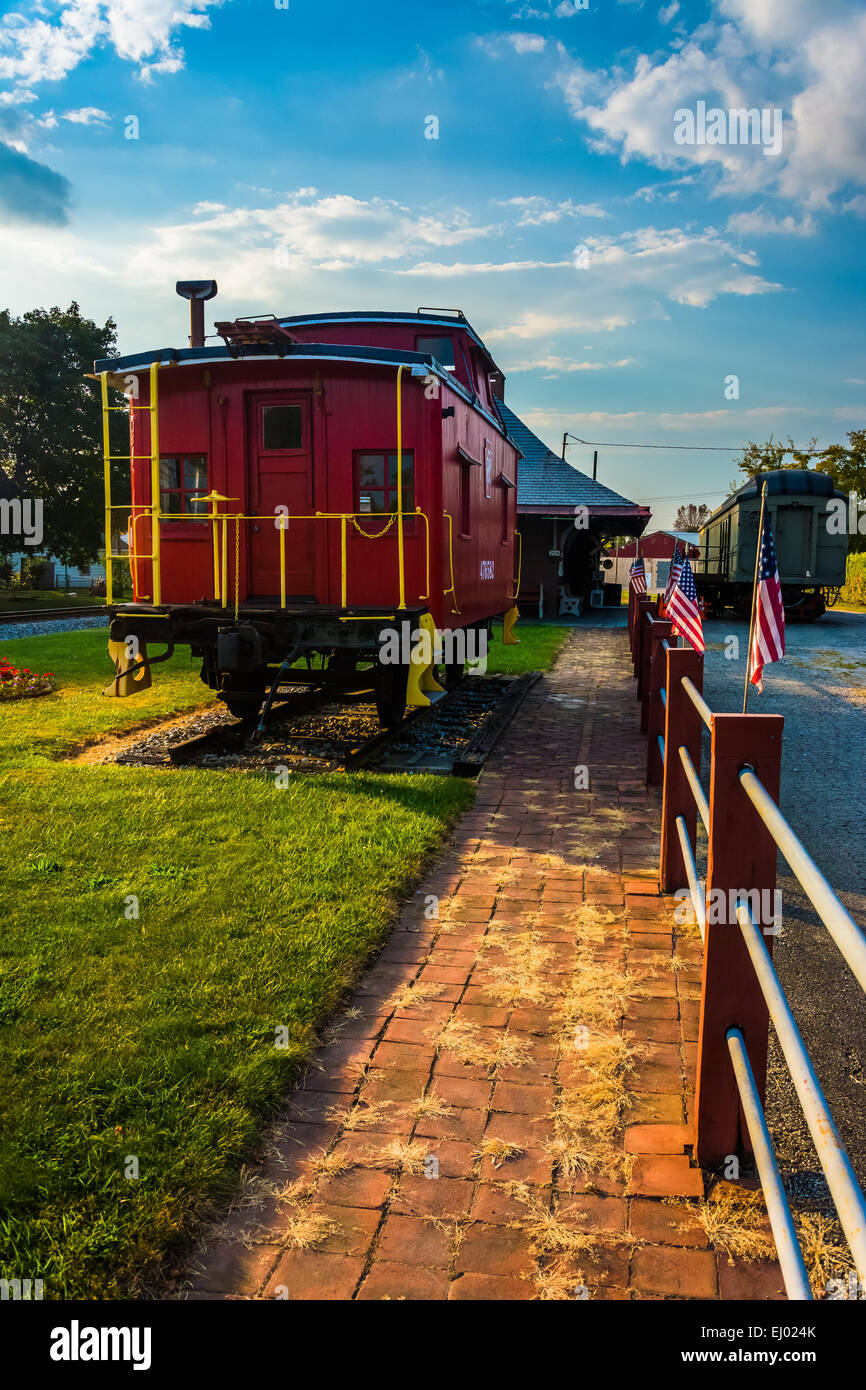 Old caboose at the railroad station in New Oxford, Pennsylvania Stock