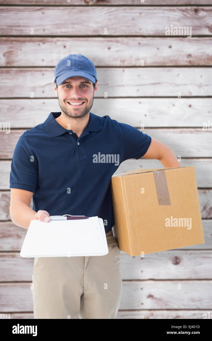 Composite Image Of Happy Delivery Man With Cardboard Box And Clipboard