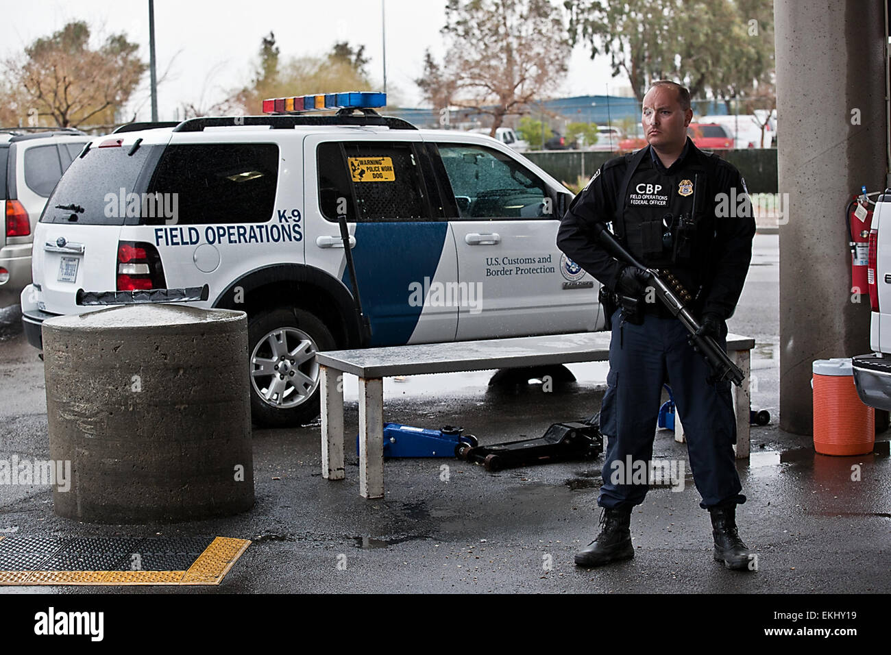 CBP Field Operations Officer conducts Vehicle Inspection in the Stock