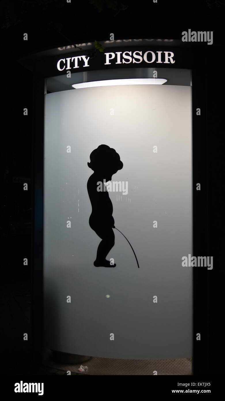 silhouette-of-a-boy-urinating-on-a-city-