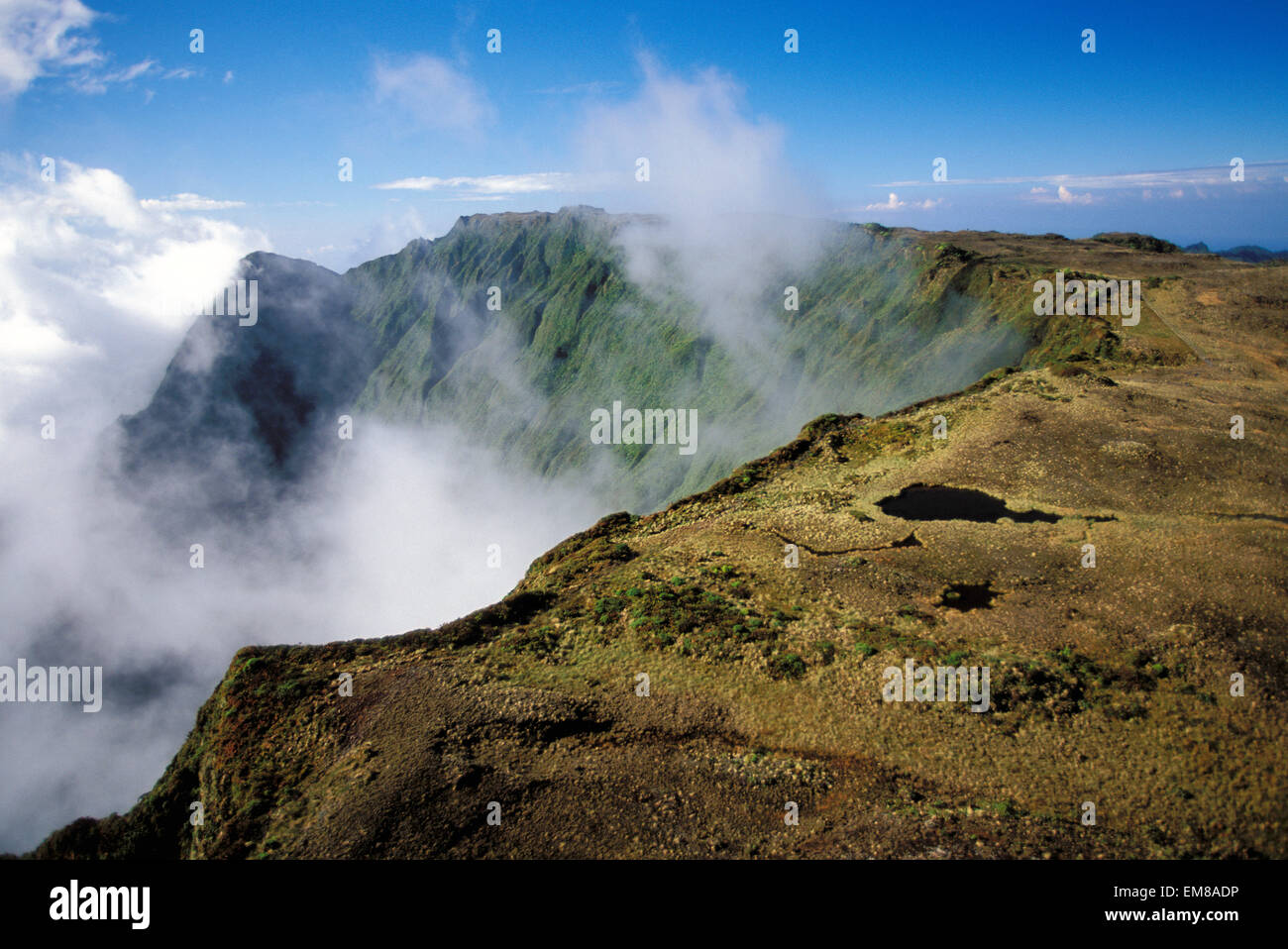 Hawaii, Kauai, Mt. Waialeale, Mountain Peak With Light Clouds Stock