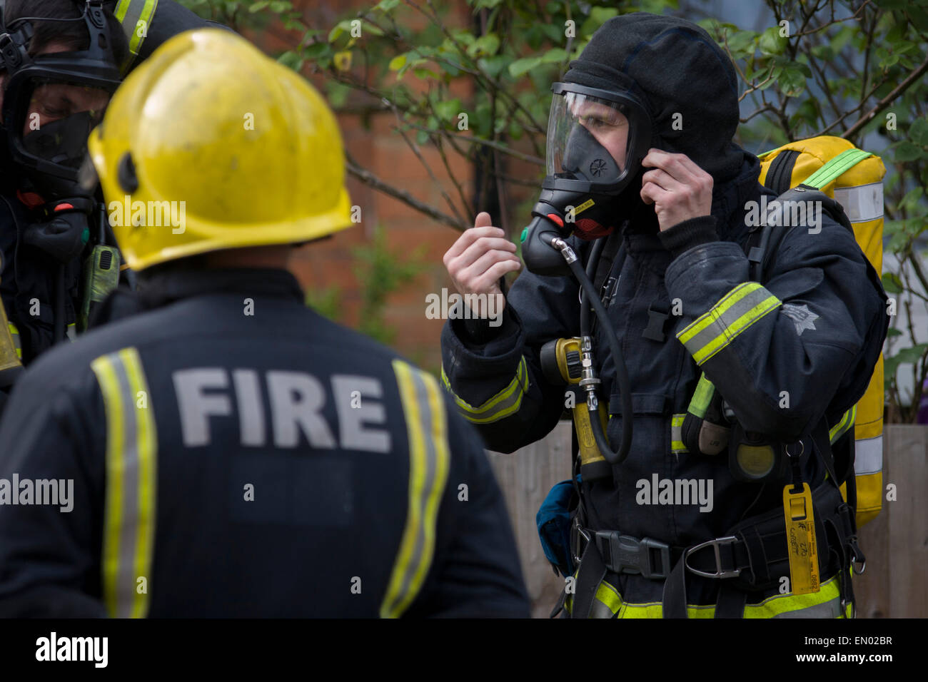 London Fire Brigade (LFB) firefighters attend a roof fire in Herne