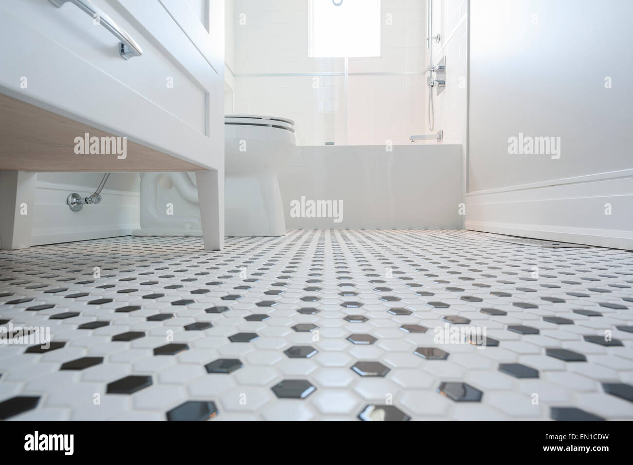 Low Angle Detail Shot Of Tiled Bathroom Floor Stock Photo Royalty
