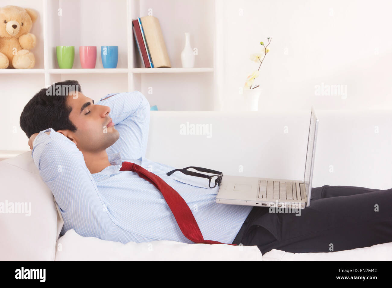 Man taking a nap on sofa Stock Photo, Royalty Free Image 81918706 Alamy