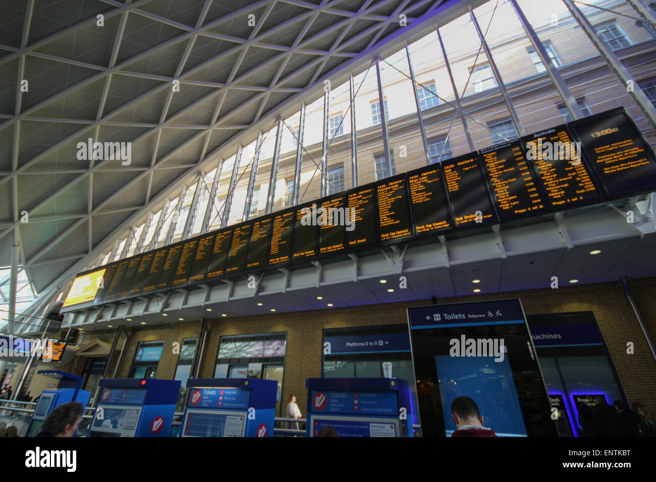 Arrival and departure boards in the concourse at King's Cross railway Stock Photo, Royalty Free Arrival and departure boards in the concourse at King's Cross railway Stock Photo, Royalty Free