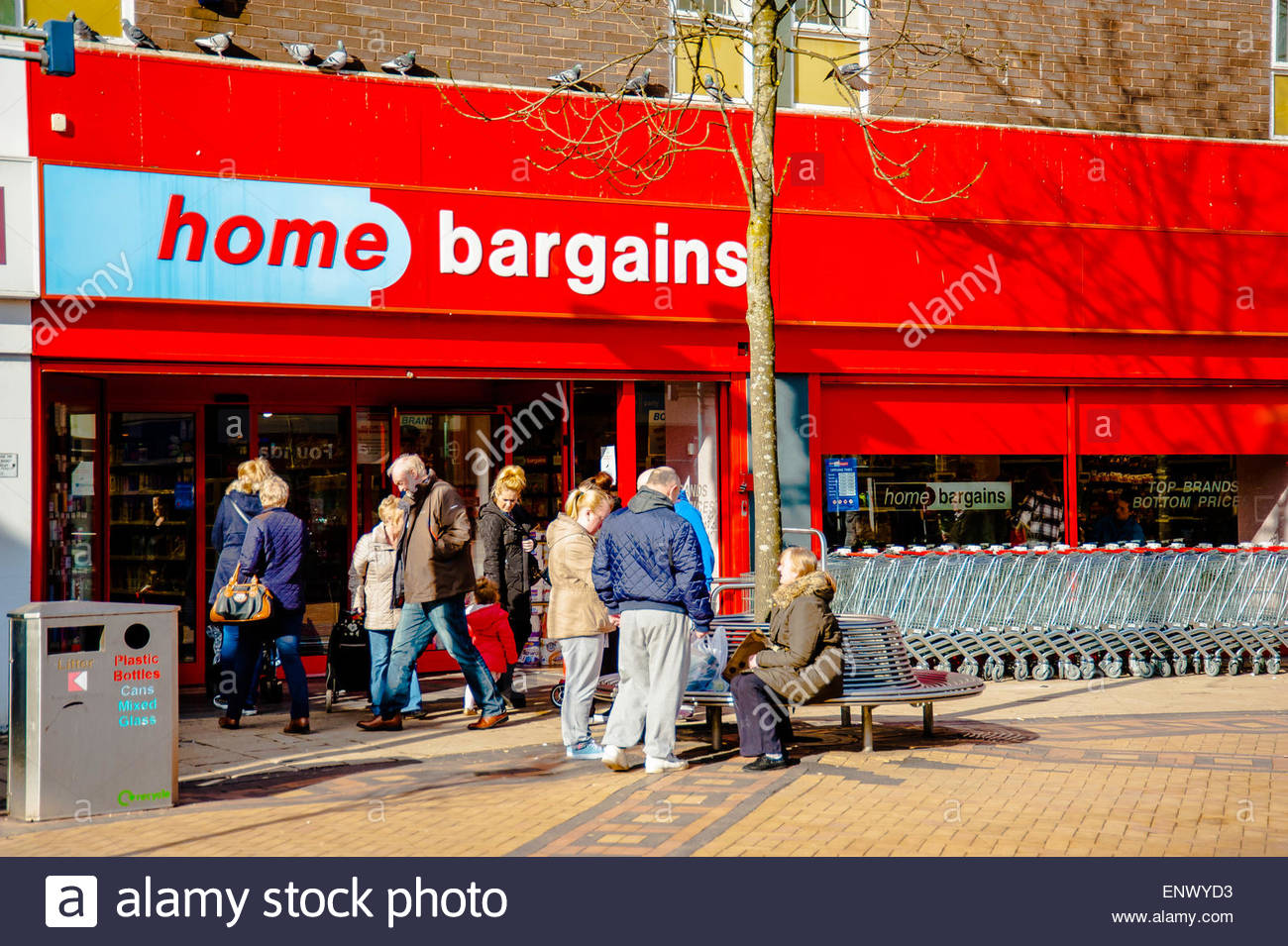 Customers & public outside a Home Bargains Discount Store in Huyton