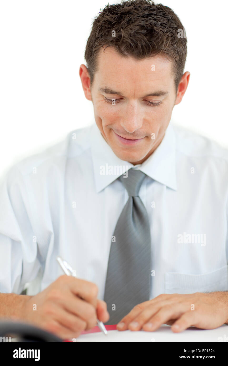 Portrait Of A Smiling Businessman Writing Stock Photo Alamy