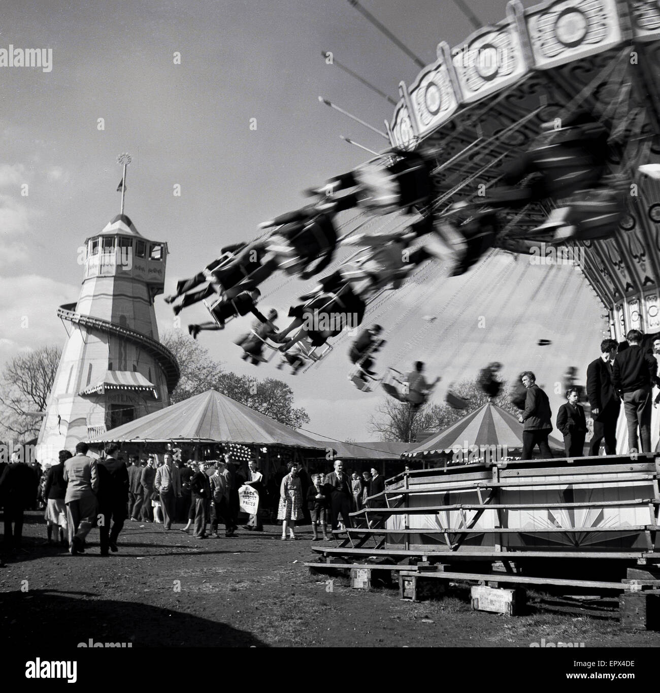 1950s, historical picture of people at a fairground or funfair on a