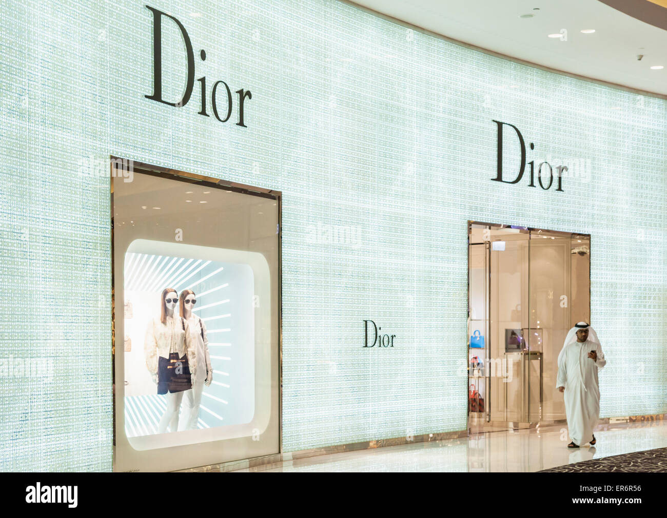 Arab shopper outside Christian Dior Shop Dubai Mall Dubai City United Stock Photo, Royalty Free