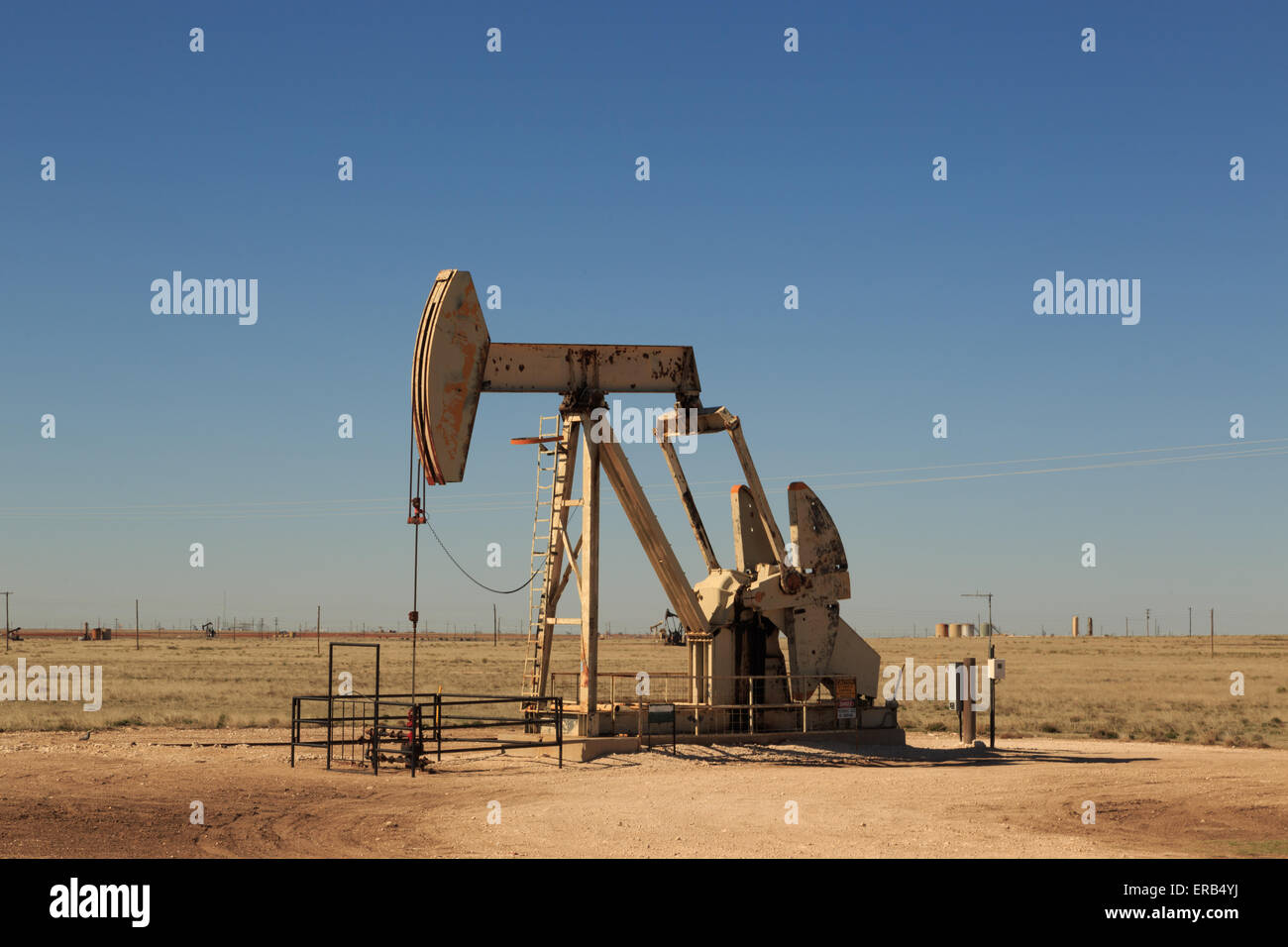 A photograph of working inland oil pump (oil donkey, nodding donkey