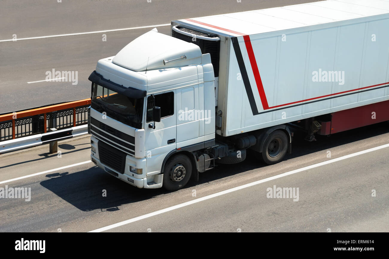 Transportation of cargoes in containers by lorry Stock Photo, Royalty