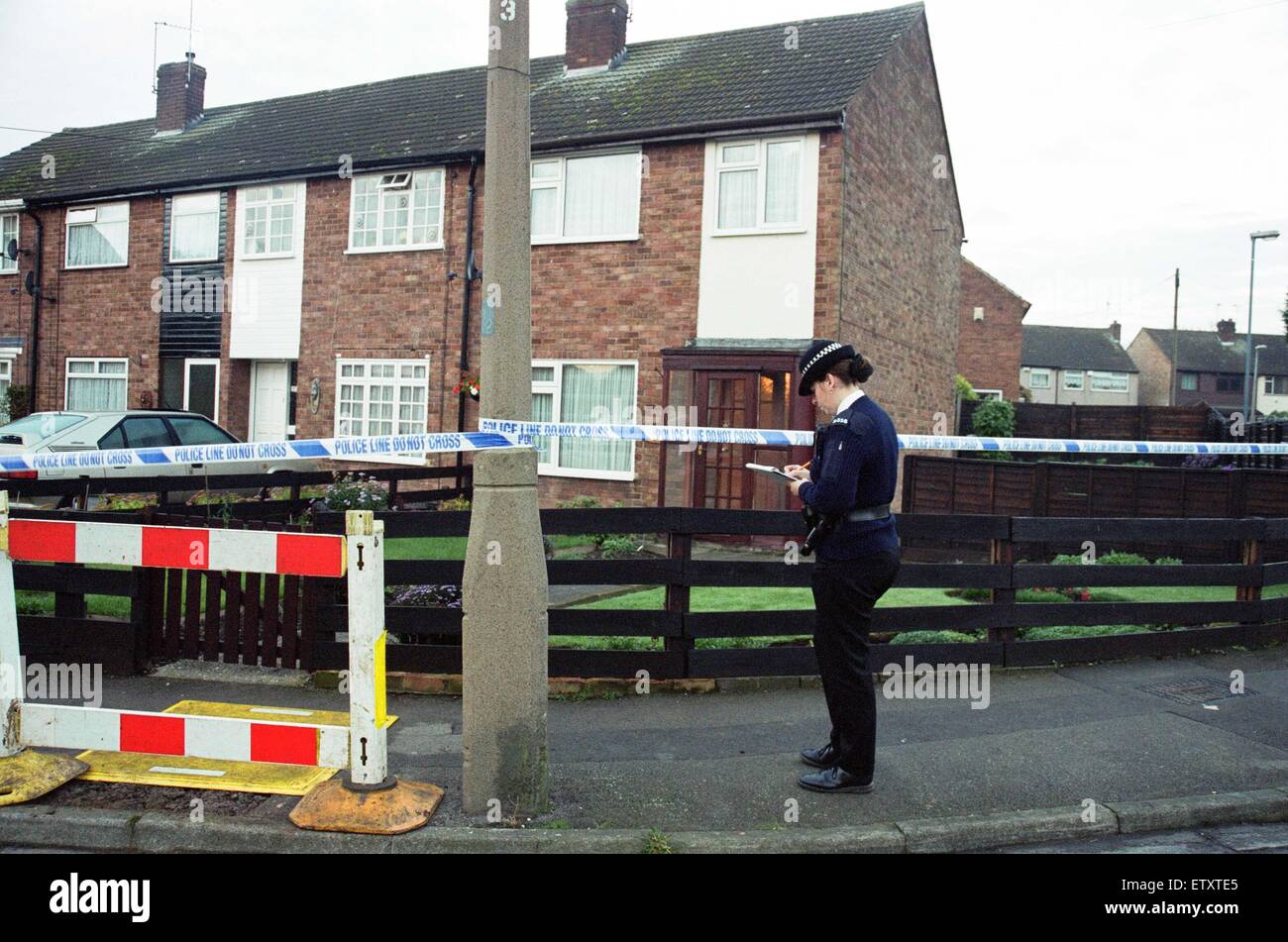 The scene at Yewdale Crescent, Potters Green, Coventry. Three people