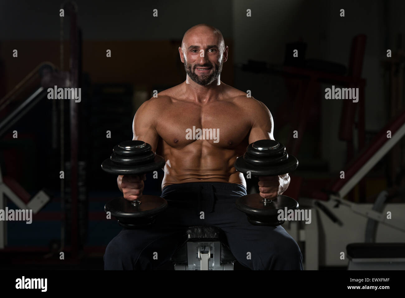 Portrait Of A Physically Fit Mature Man In A Healthy Club Stock Photo