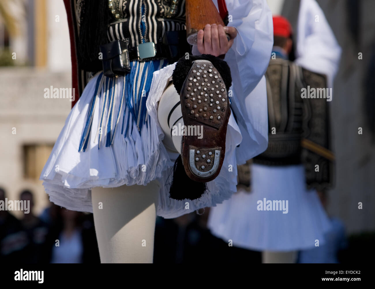 Closeup of tsarouhi traditional shoe of Greek Tsolias Evzone. Horse