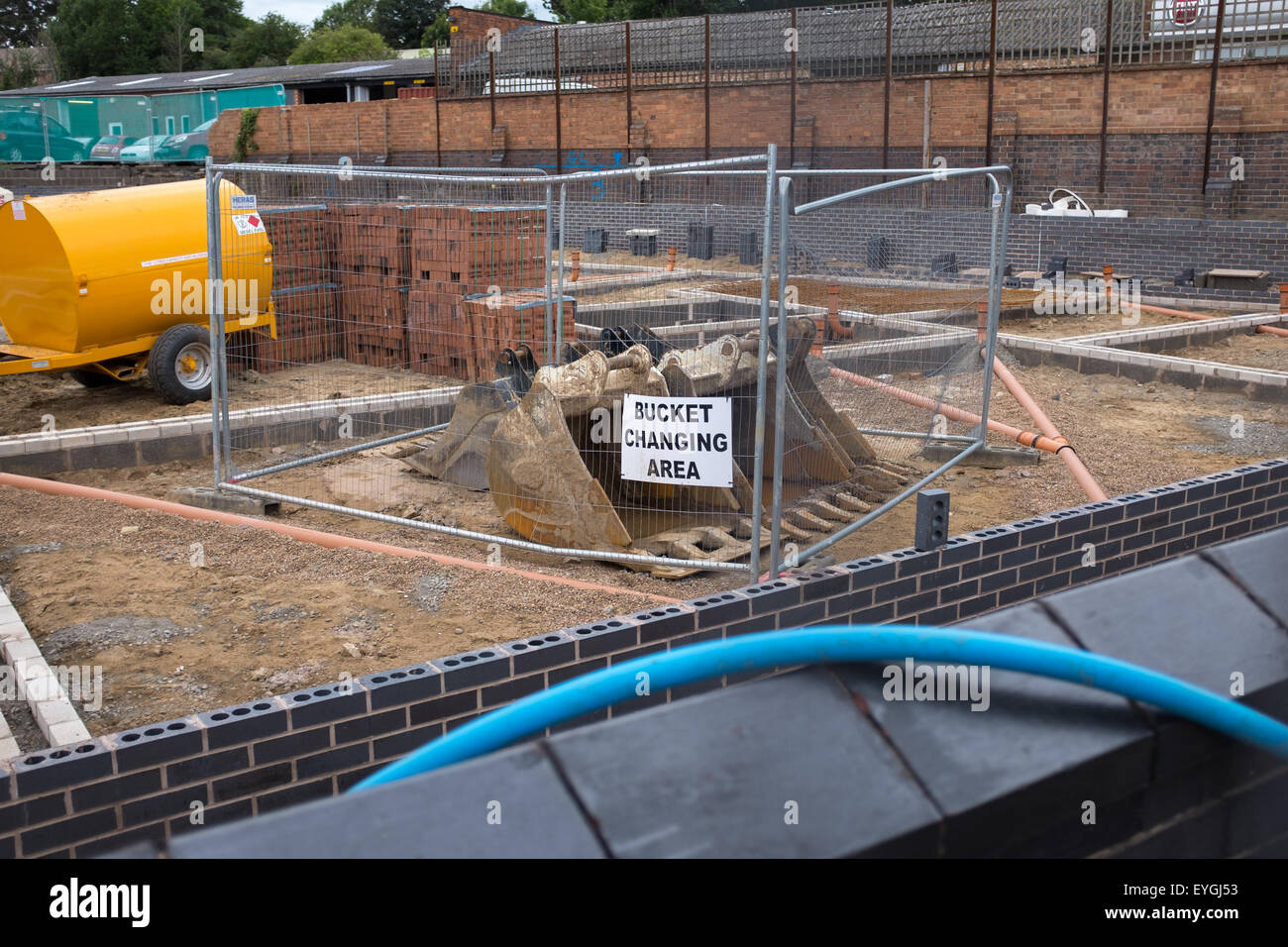 Bucket changing area on a UK construction building site Stock Photo