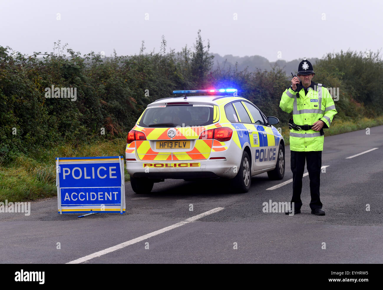 Police at a road closed road traffic collision incident, Policeman