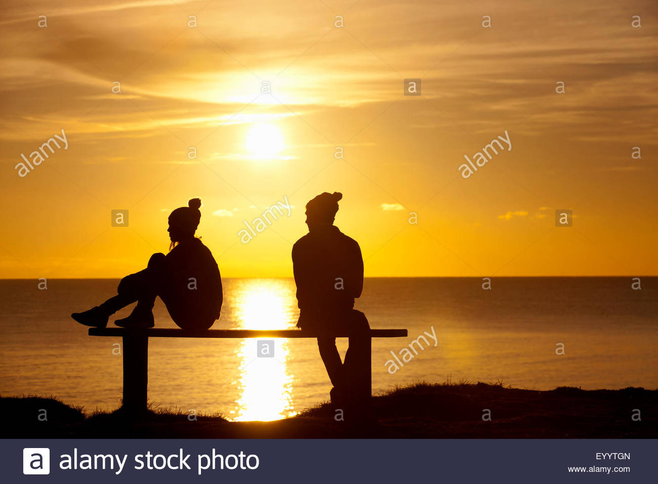 Silhouette of couple, sitting separately on bench, against sunset ... for People On Bench Silhouette
186ref Silhouette of couple, sitting separately on bench, against sunset ... for People On Bench Silhouette
186ref