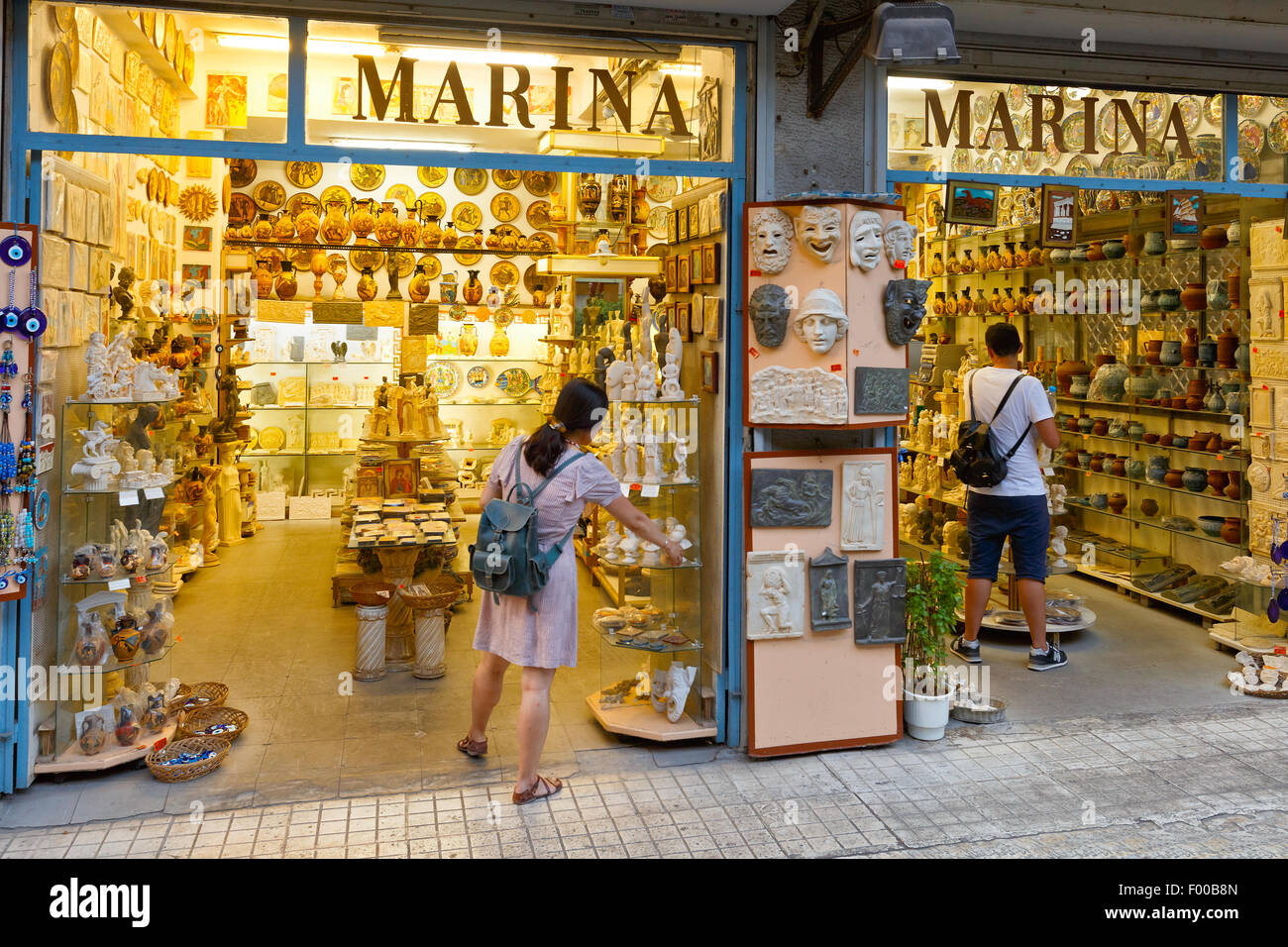Tourists in a Greek souvenir shop in Plaka, Athens Stock Photo, Royalty