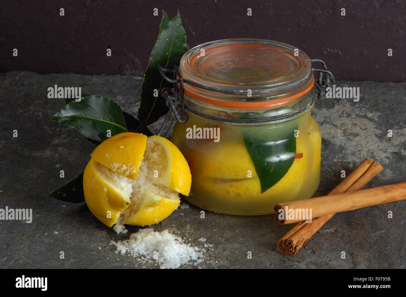 candying lemons by storing them in a heated sugar syrup in candying lemons by storing them in a heated sugar syrup in