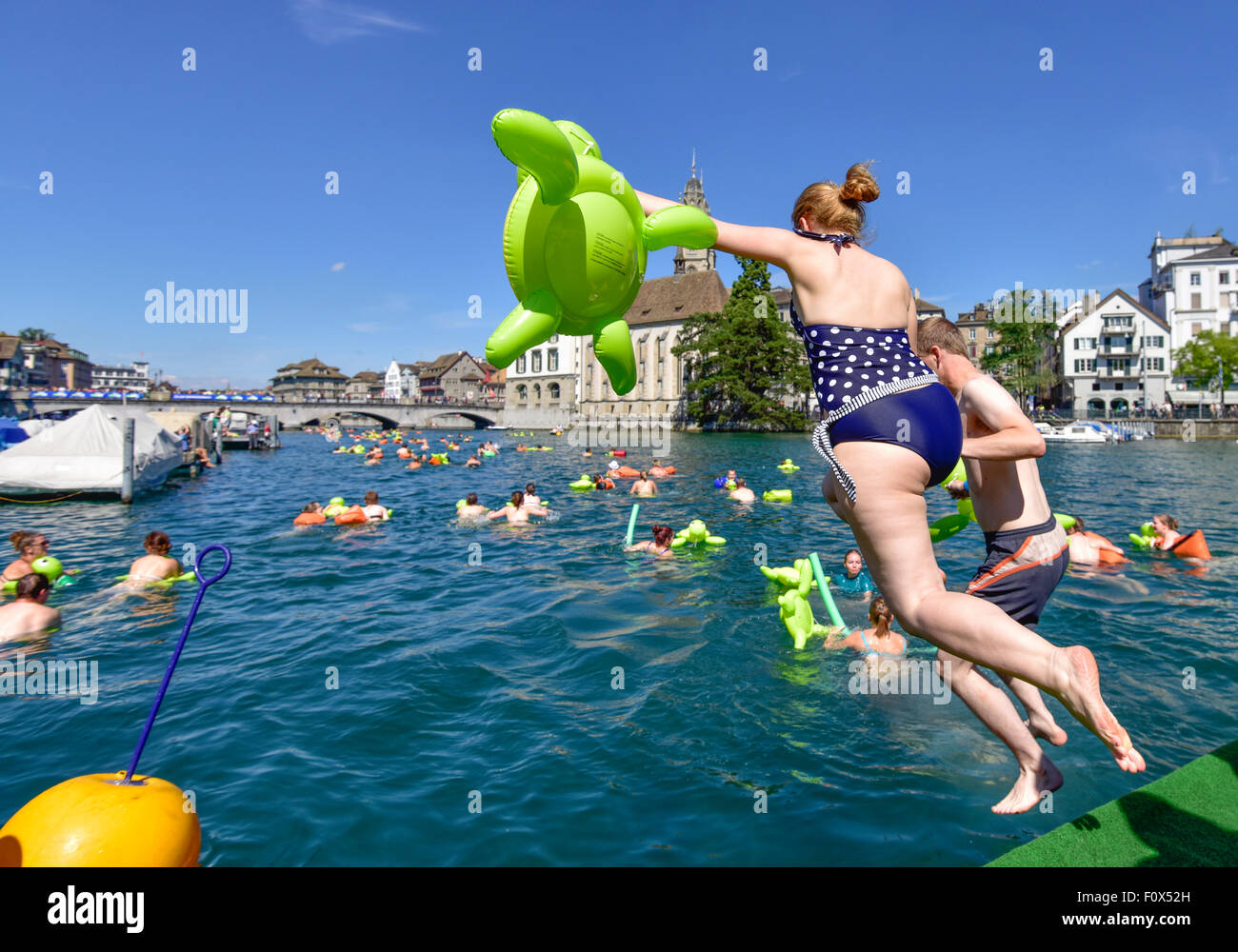Zurich, Switzerland. 22nd August, 2015. Swimmers are jumping into Stock