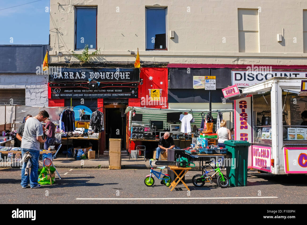 Stall holder at the famous Glasgow street market, The Barras, selling