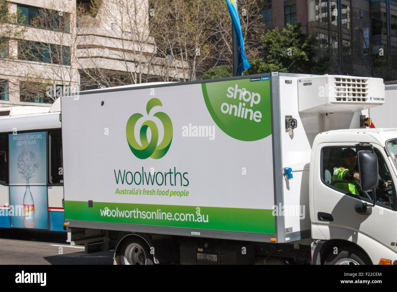 australian woolworths supermarket delivery vehicle in Sydney taking Stock Photo, Royalty Free