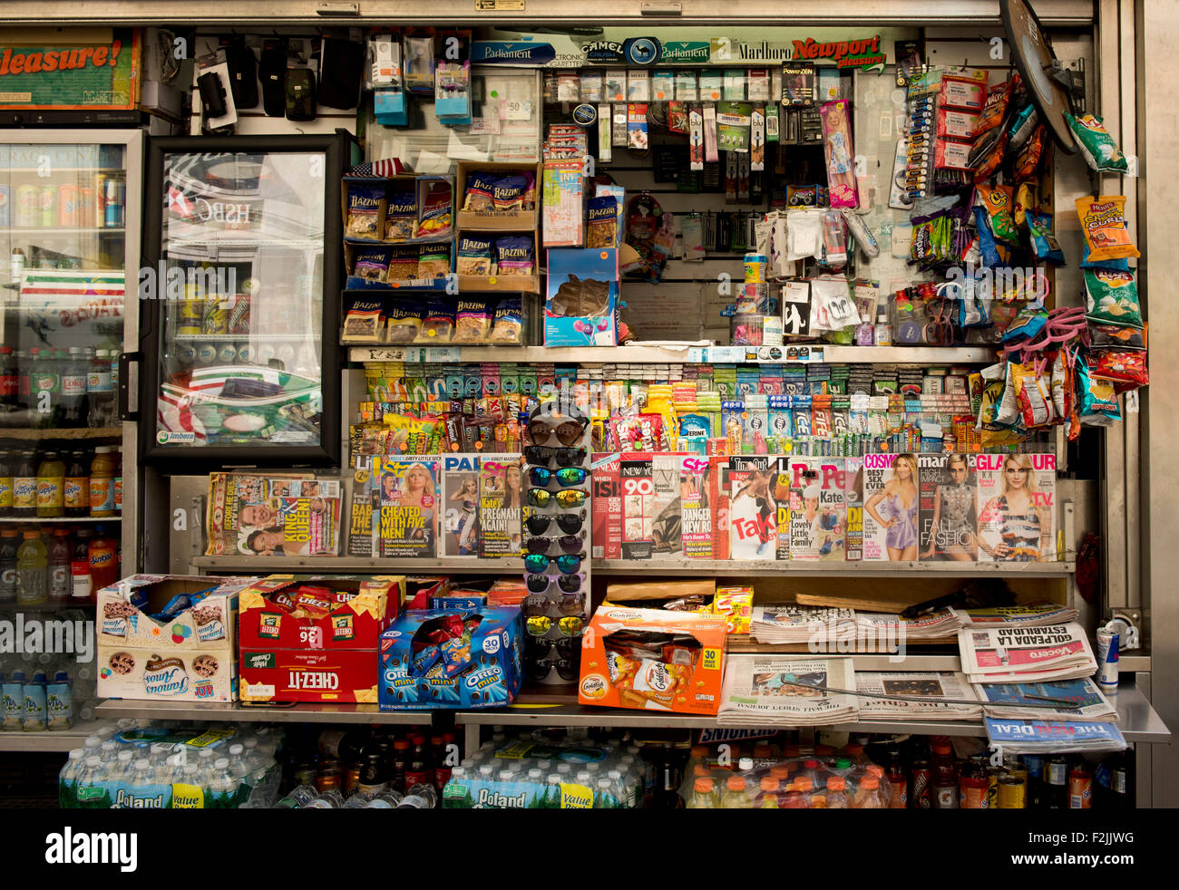 A cluttered Manhattan newsstand selling newspapers, magazines Stock