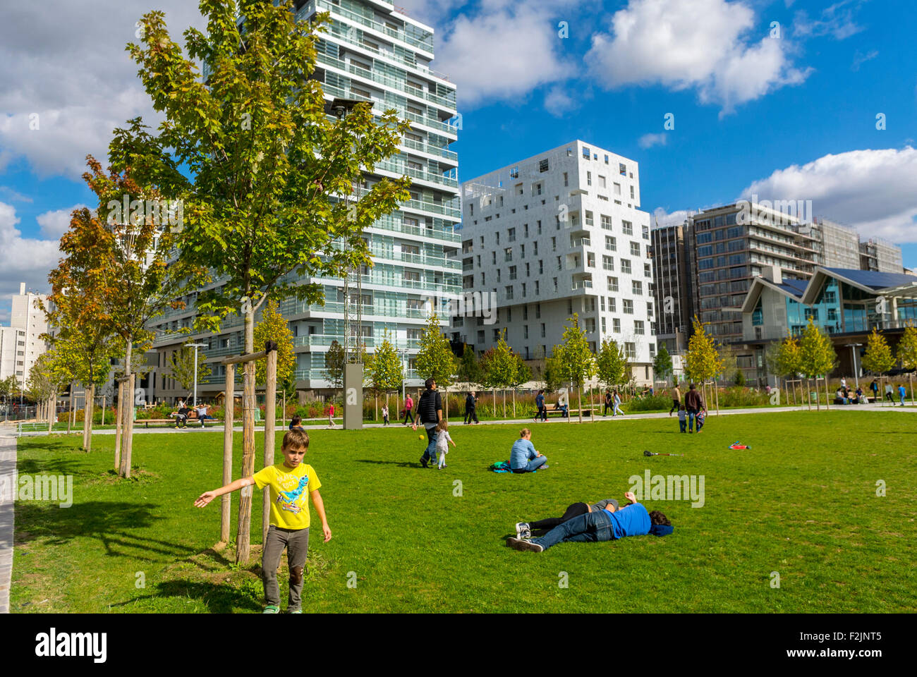 Modern Architecture France paris, france, family picnicking in park with new modern Modern Architecture France paris, france, family picnicking in park with new modern