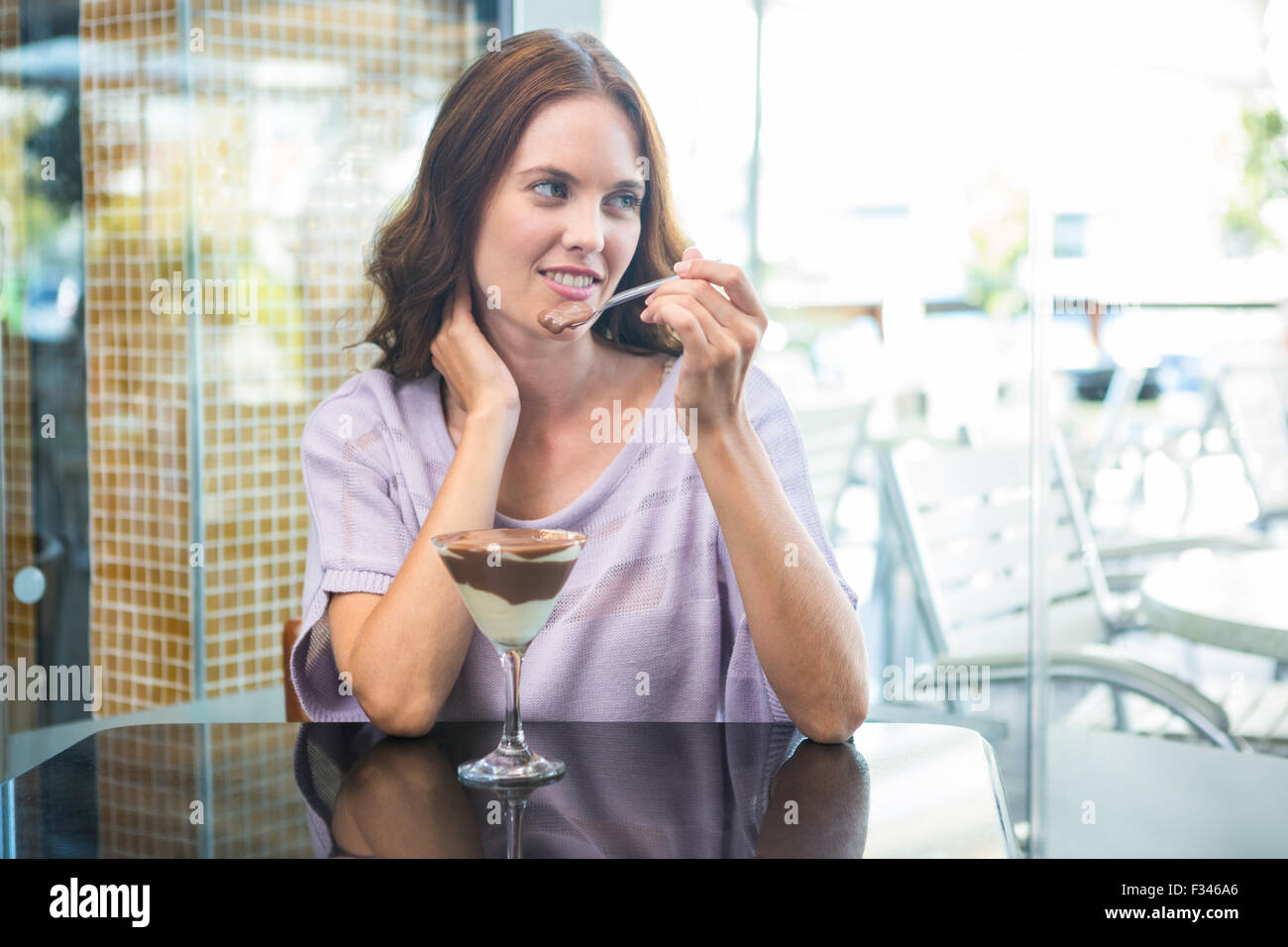 Pretty Brunette Enjoying Chocolate Dessert Stock Photo Alamy