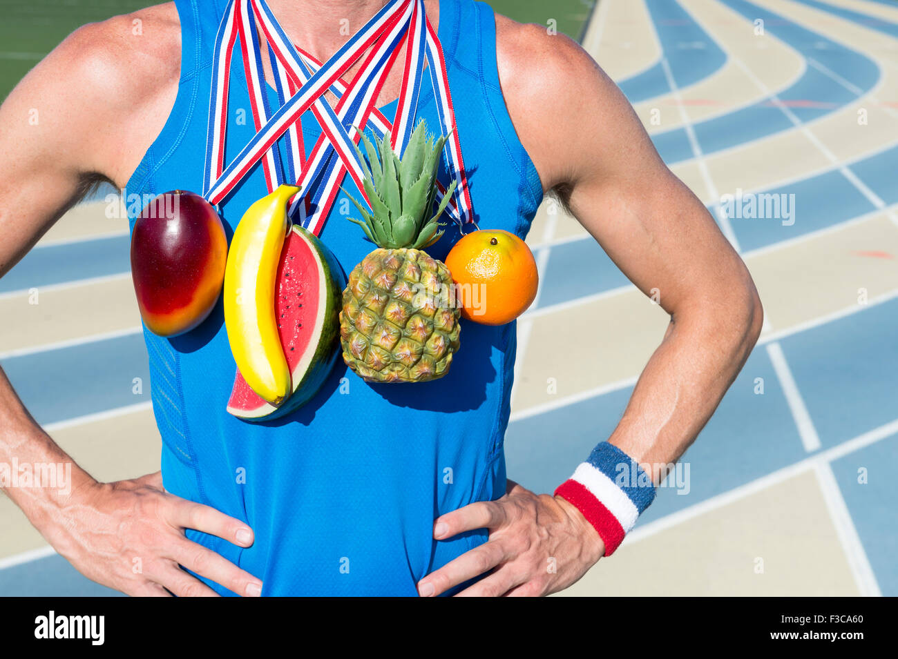 winner-of-healthy-eating-competition-standing-at-running-track-with-F3CA60.jpg