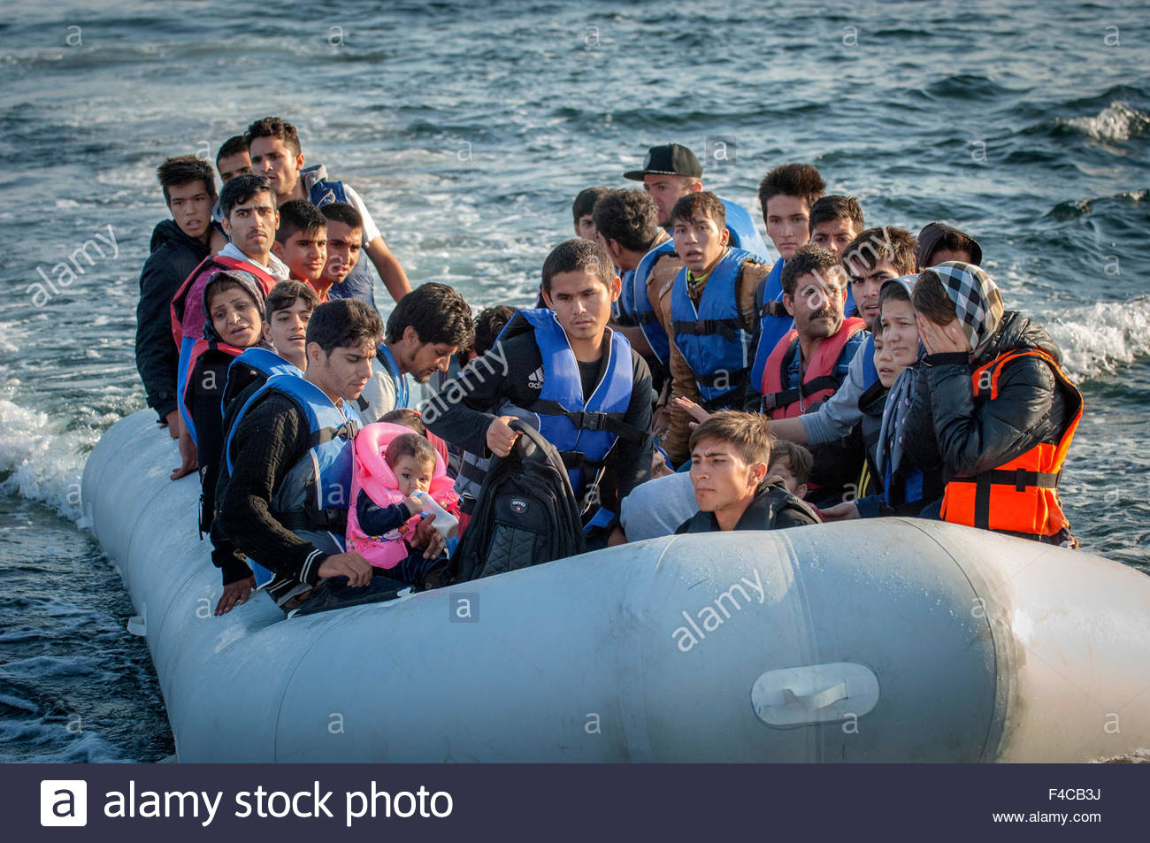 syrian refugees boat syrian and afghan refugees arrive by boat from the western syrian refugees boat syrian and afghan refugees arrive by boat from the western